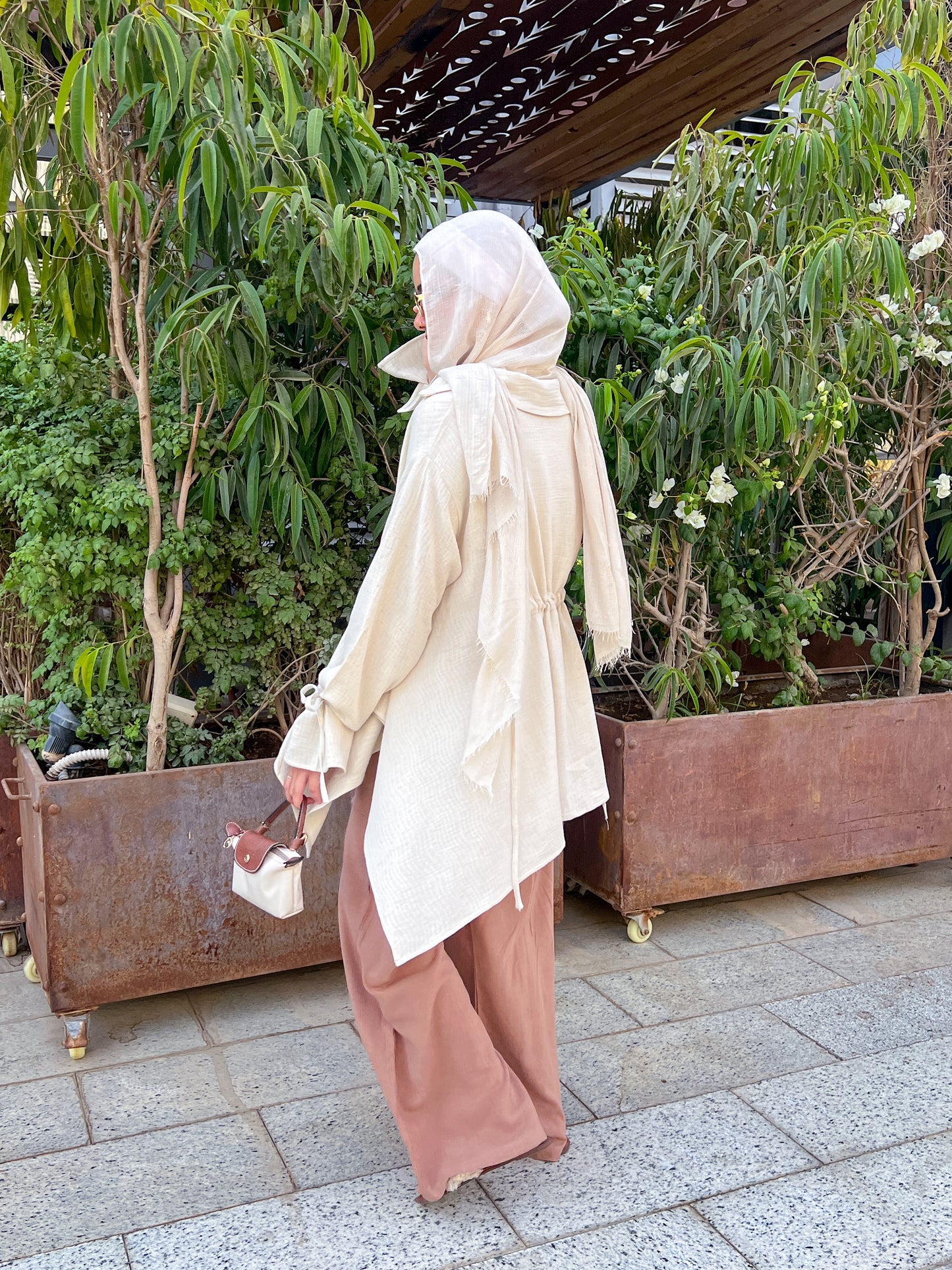Asymmetrical beige top