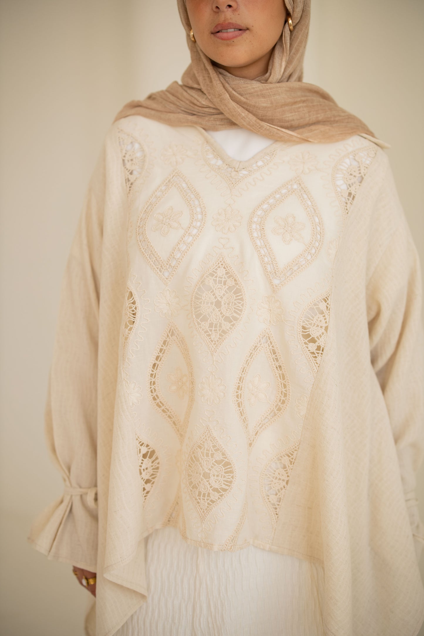Asymmetrical beige top