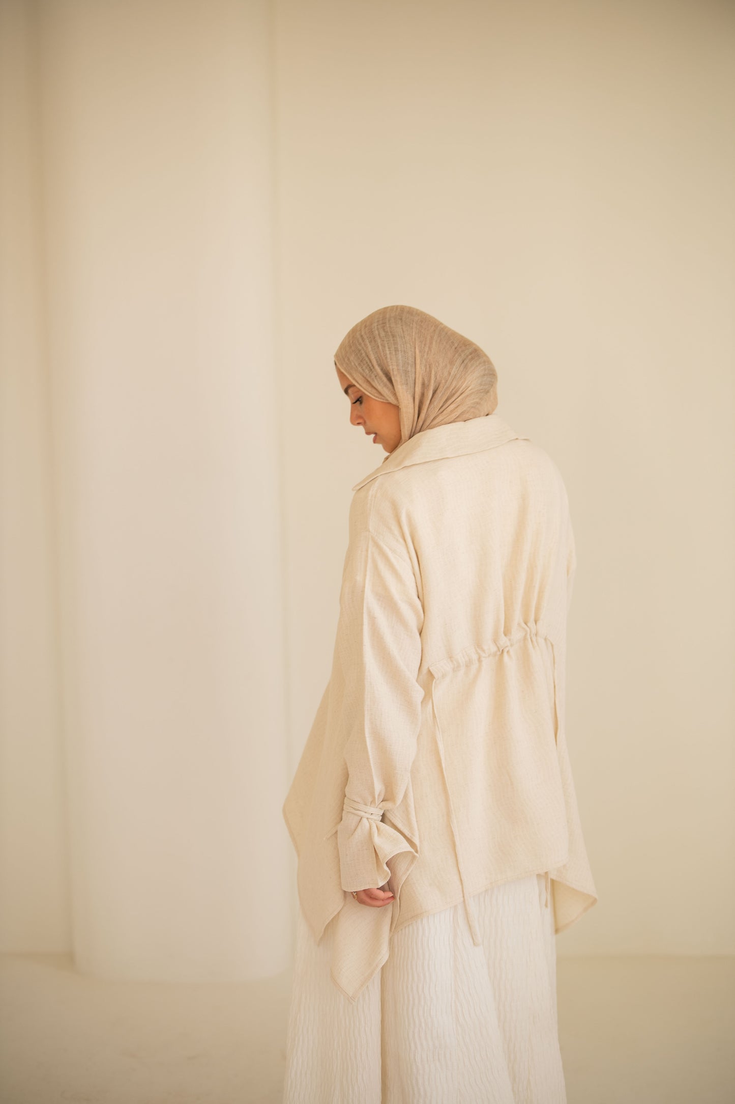 Asymmetrical beige top