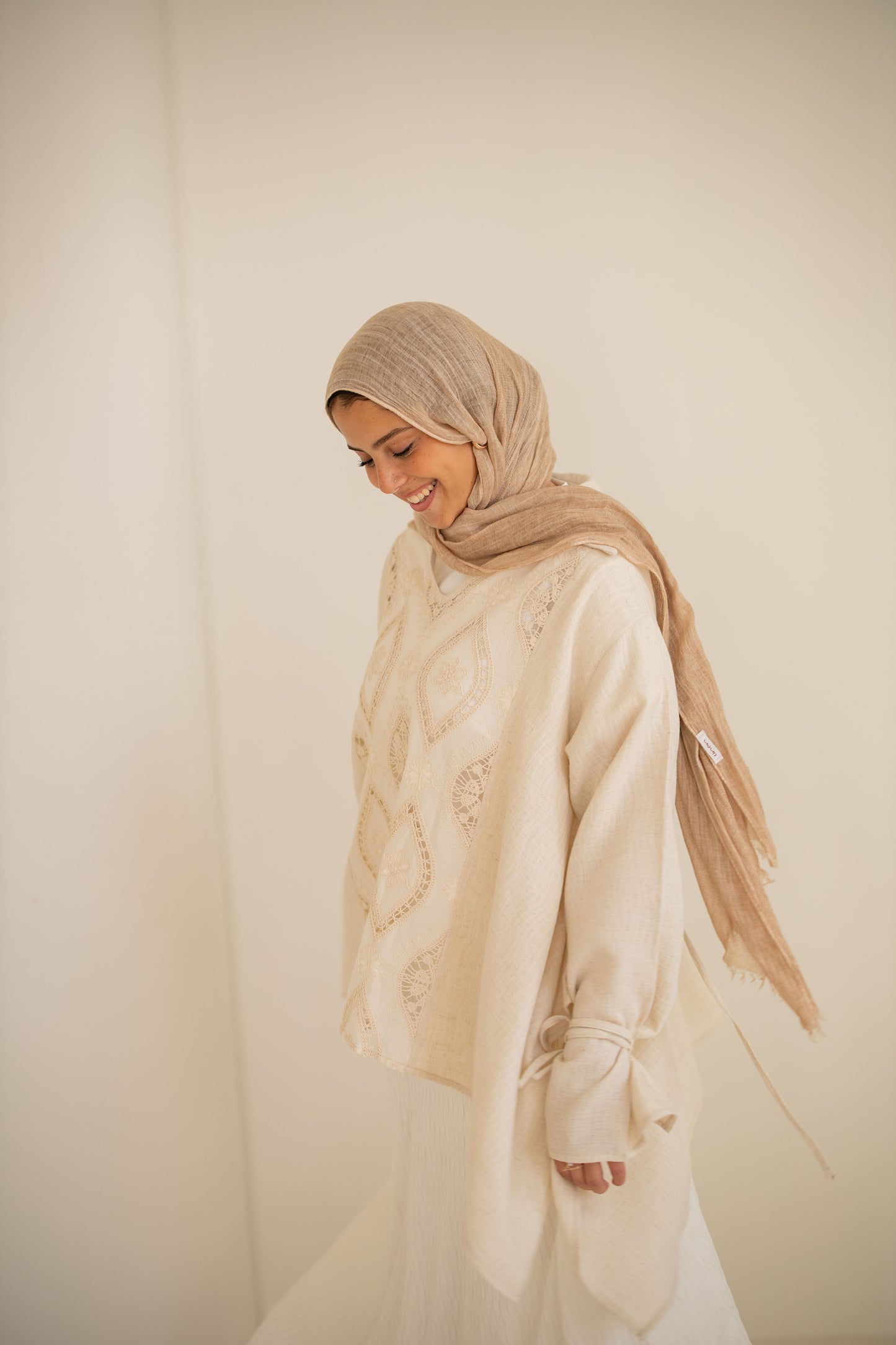 Asymmetrical beige top